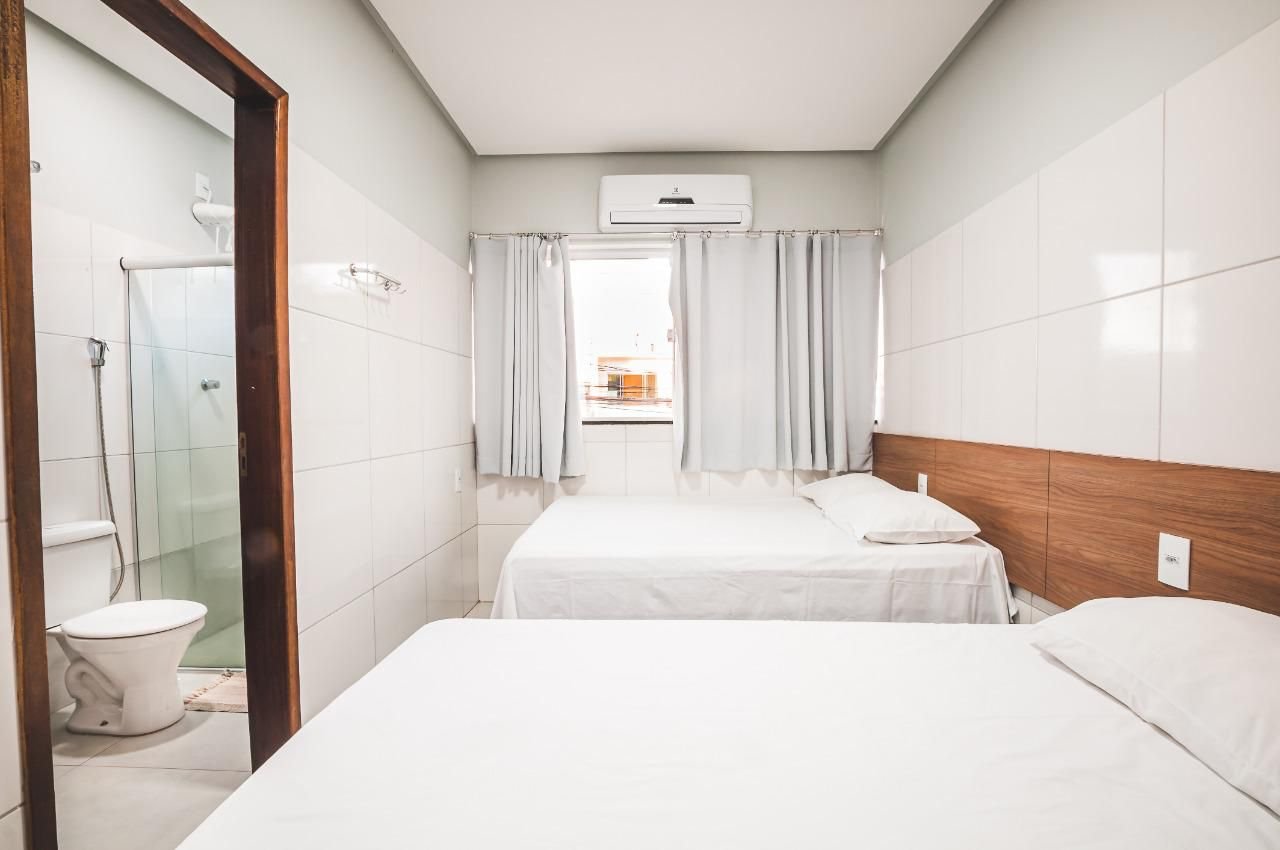 Foto de um quarto de solteiro do hotel